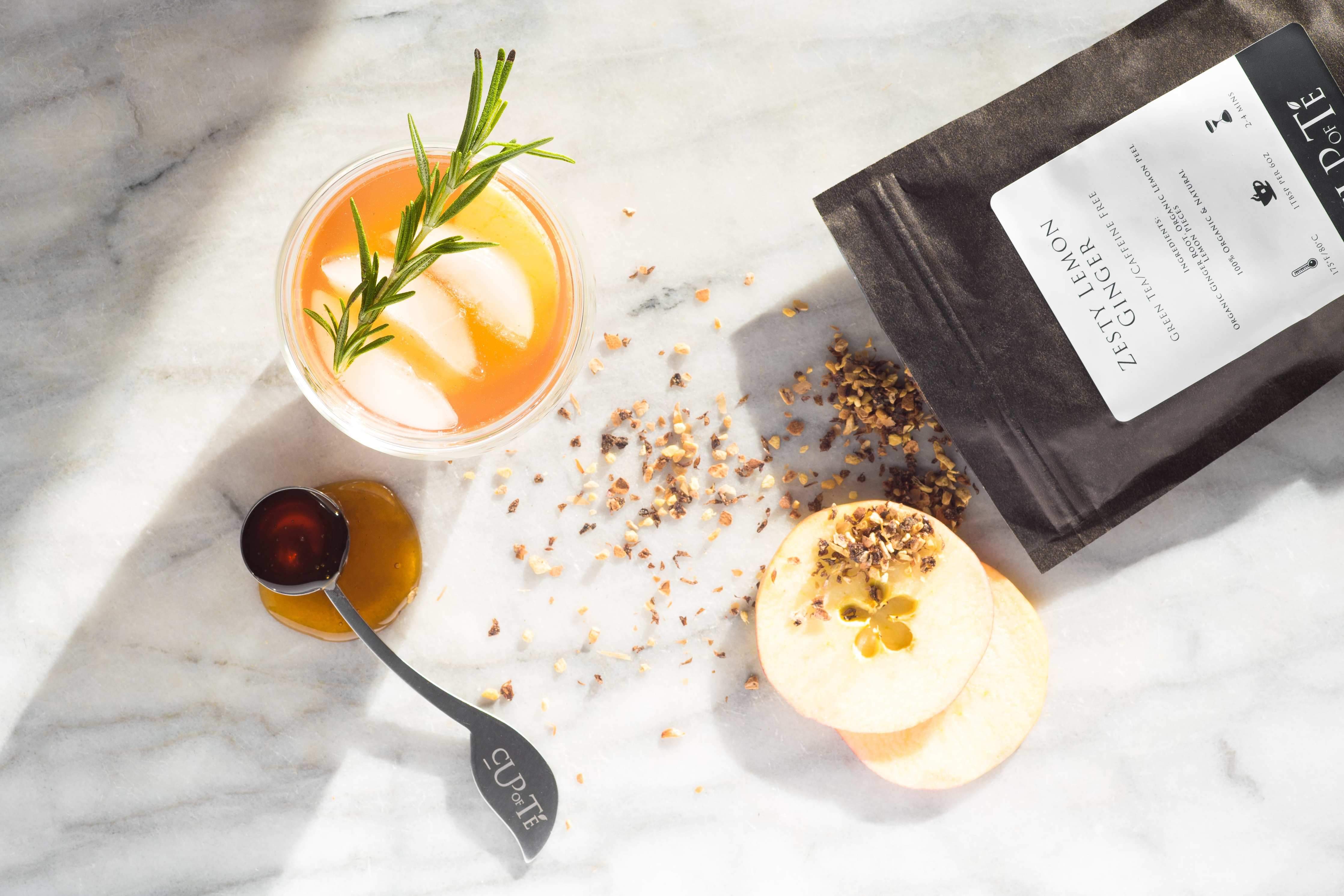 Cup of Té Leaf Sweetener Spoon